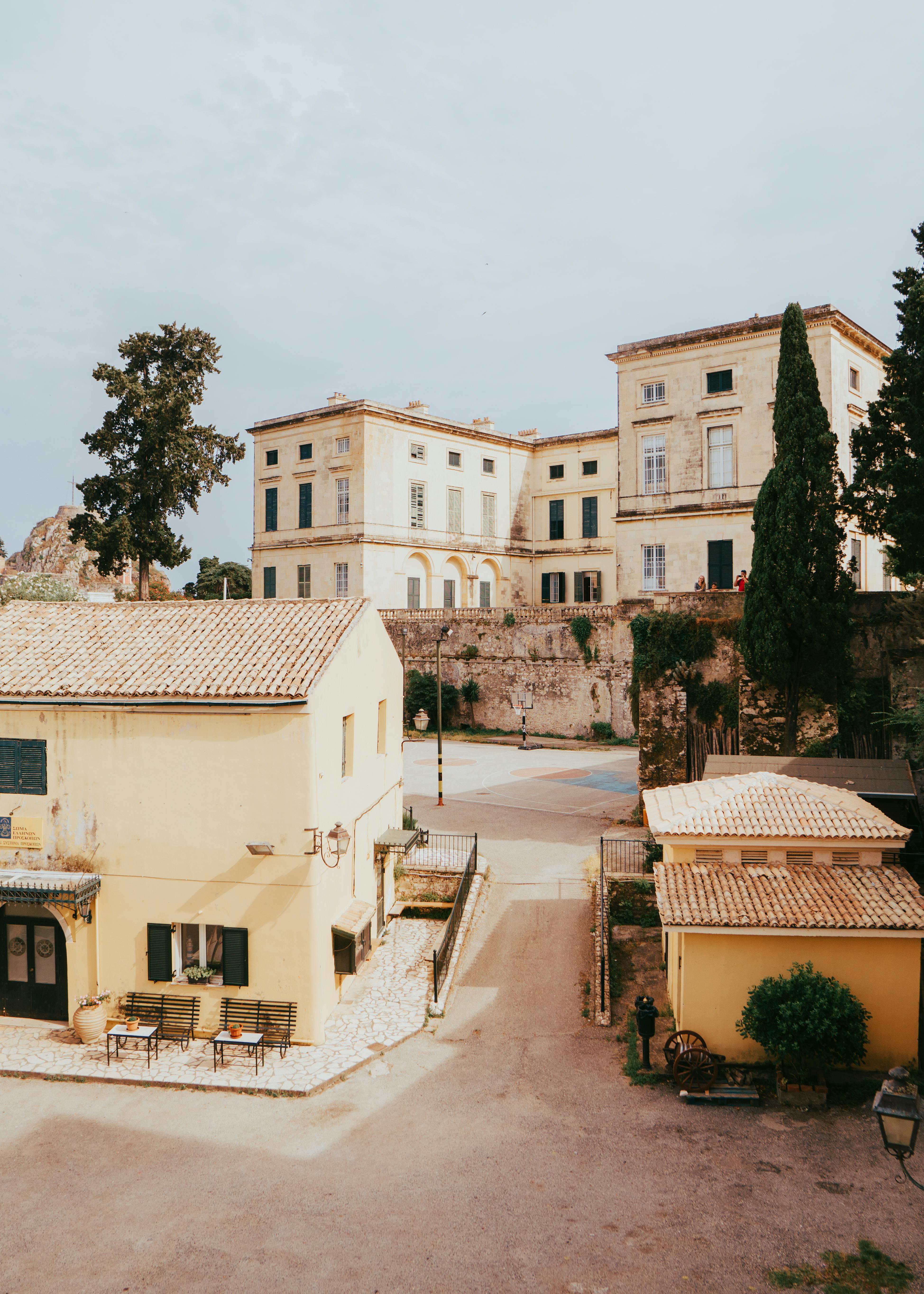 A sunny view of historic buildings and streets in Kerkyra, offering an authentic Greek town atmosphere.