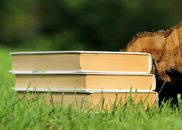 Selective Focus Photography of 3 Book Piled