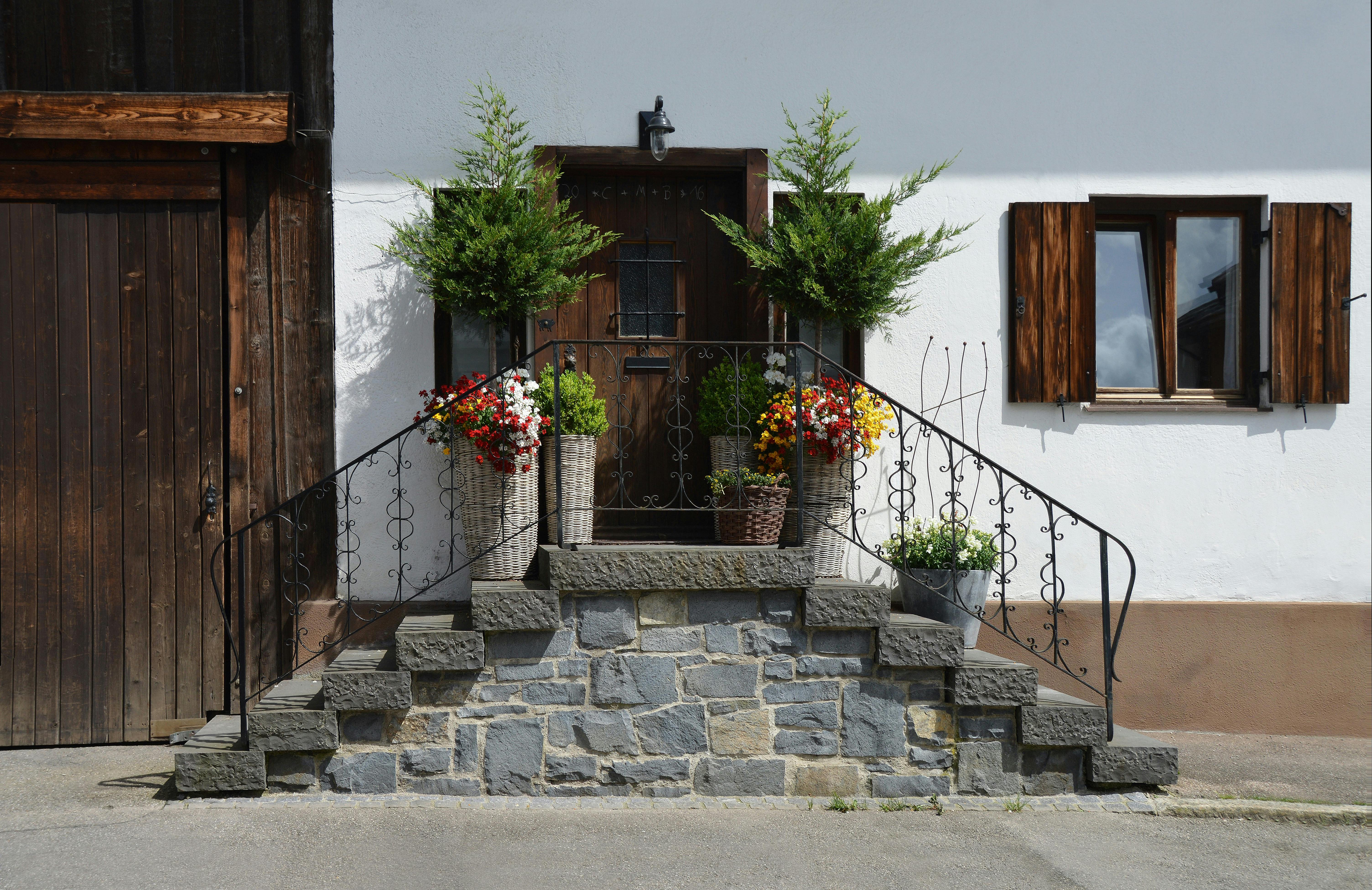 door surrounded by flowers