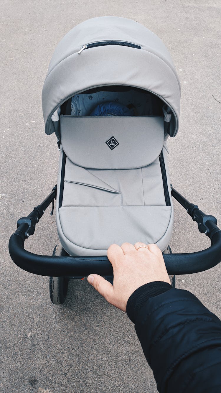 Man Pushing A Stroller