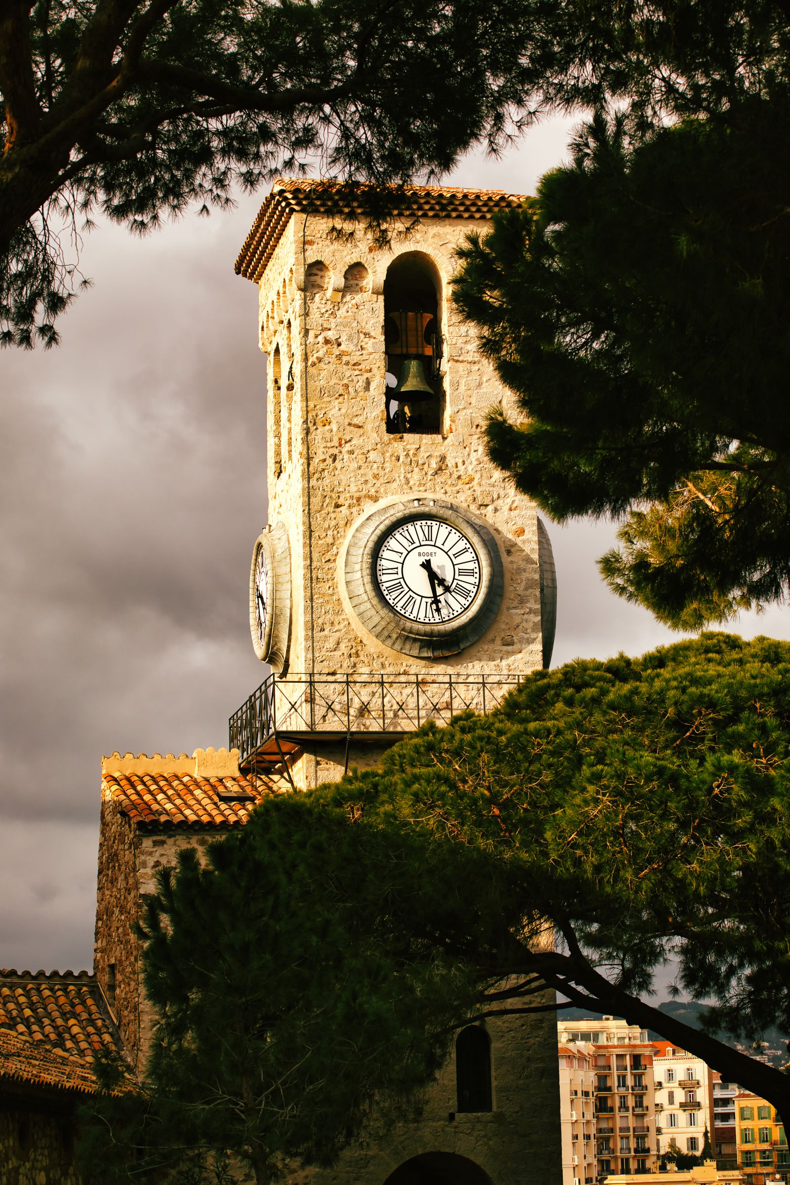 The medieval stone watchtower of Le Suquet in Cannes framed by umbrella pines
