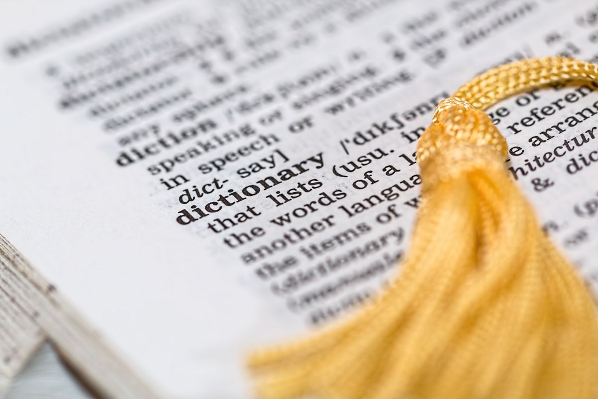 A dictionary page open to the word dictionary — the Book is its own dictionary