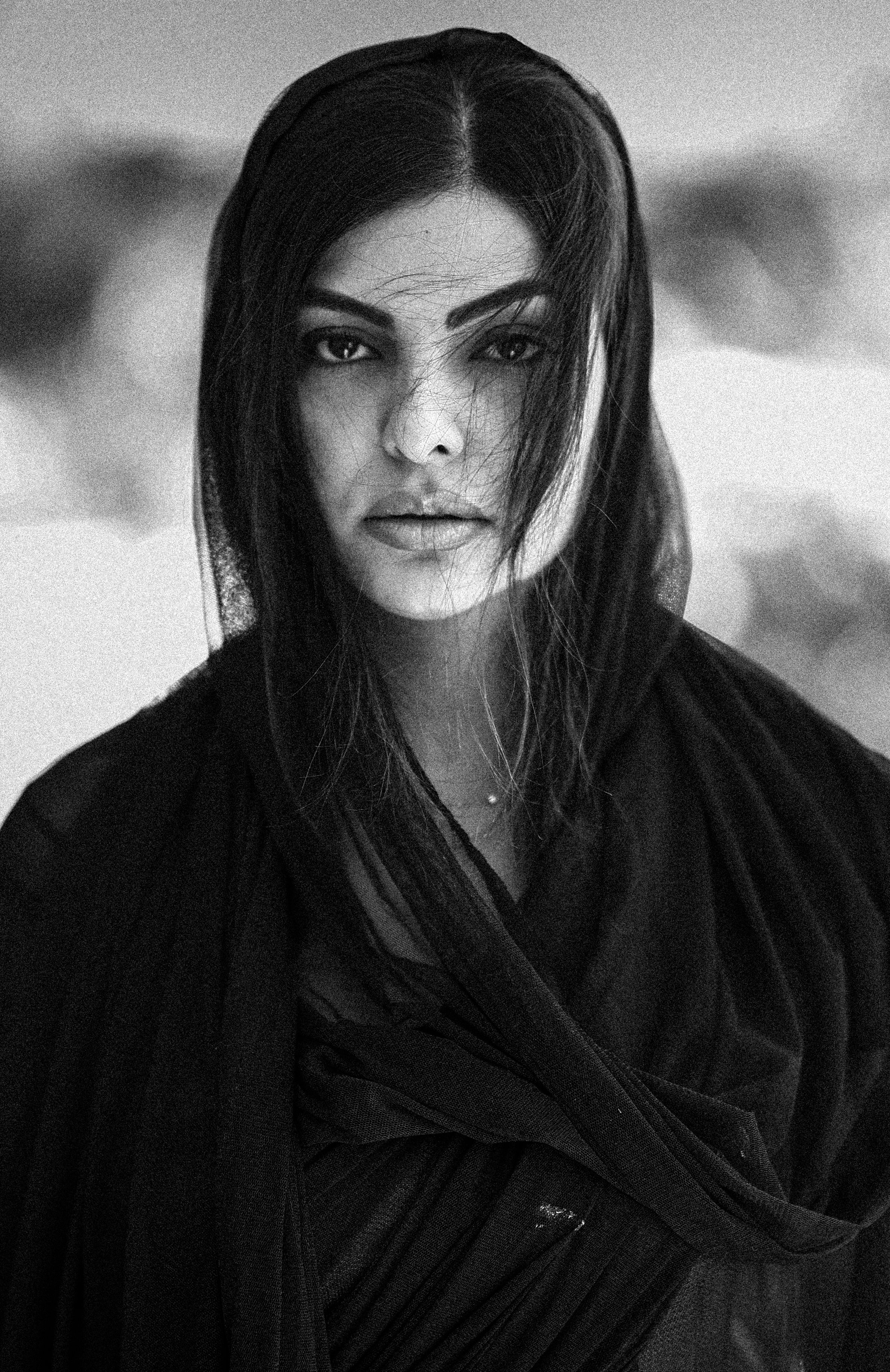 Black and White Portrait of a Young Woman Wearing a Headscarf · Free ...