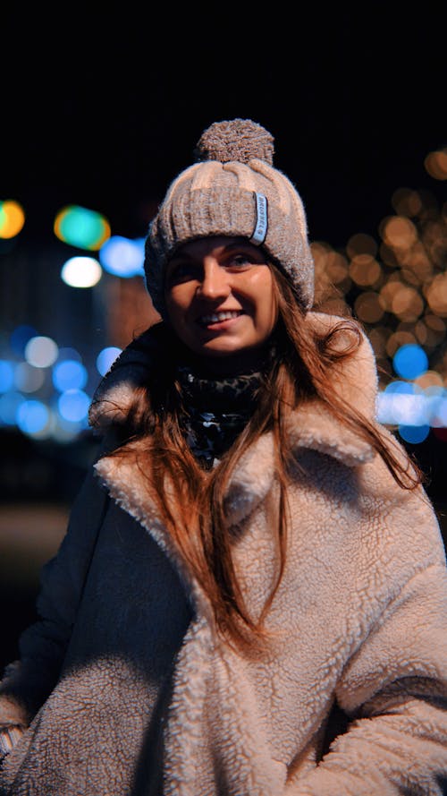 Smiling Woman at Night