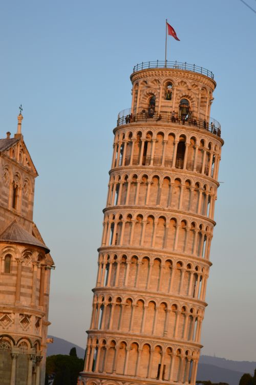 Free Captivating view of the Leaning Tower of Pisa during sunset in Italy. Stock Photo