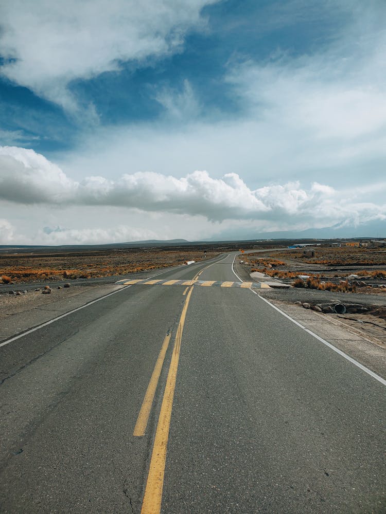 Clouds Over Empty Road