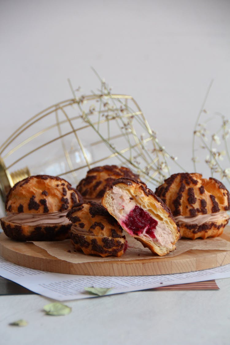 Stack Of Filled Pastries On A Wooden Tray