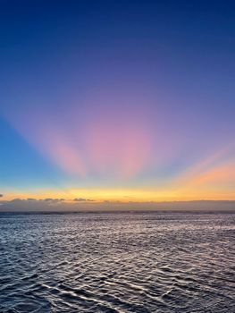 Beautiful sunset with orange and pink sky over the ocean in West Nusa Tenggara.