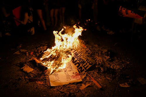 View of Protest Signs being Burned in a Bonfire 