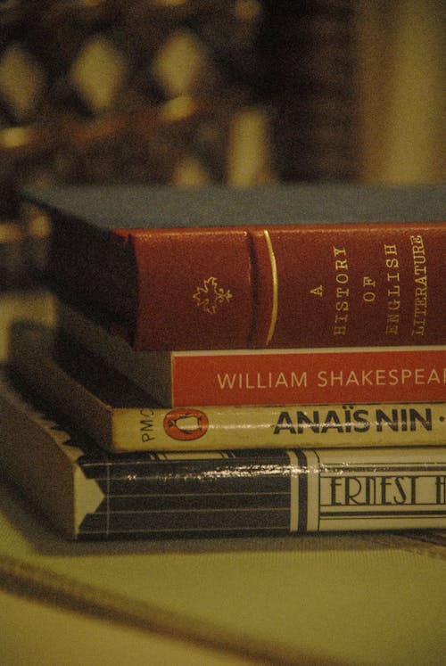 Close-up of a Pile of Books on a Desk 