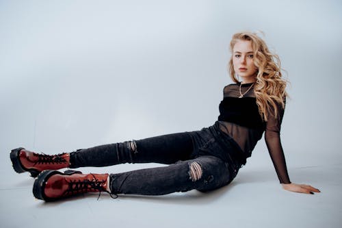 Blonde Woman Sitting and Posing