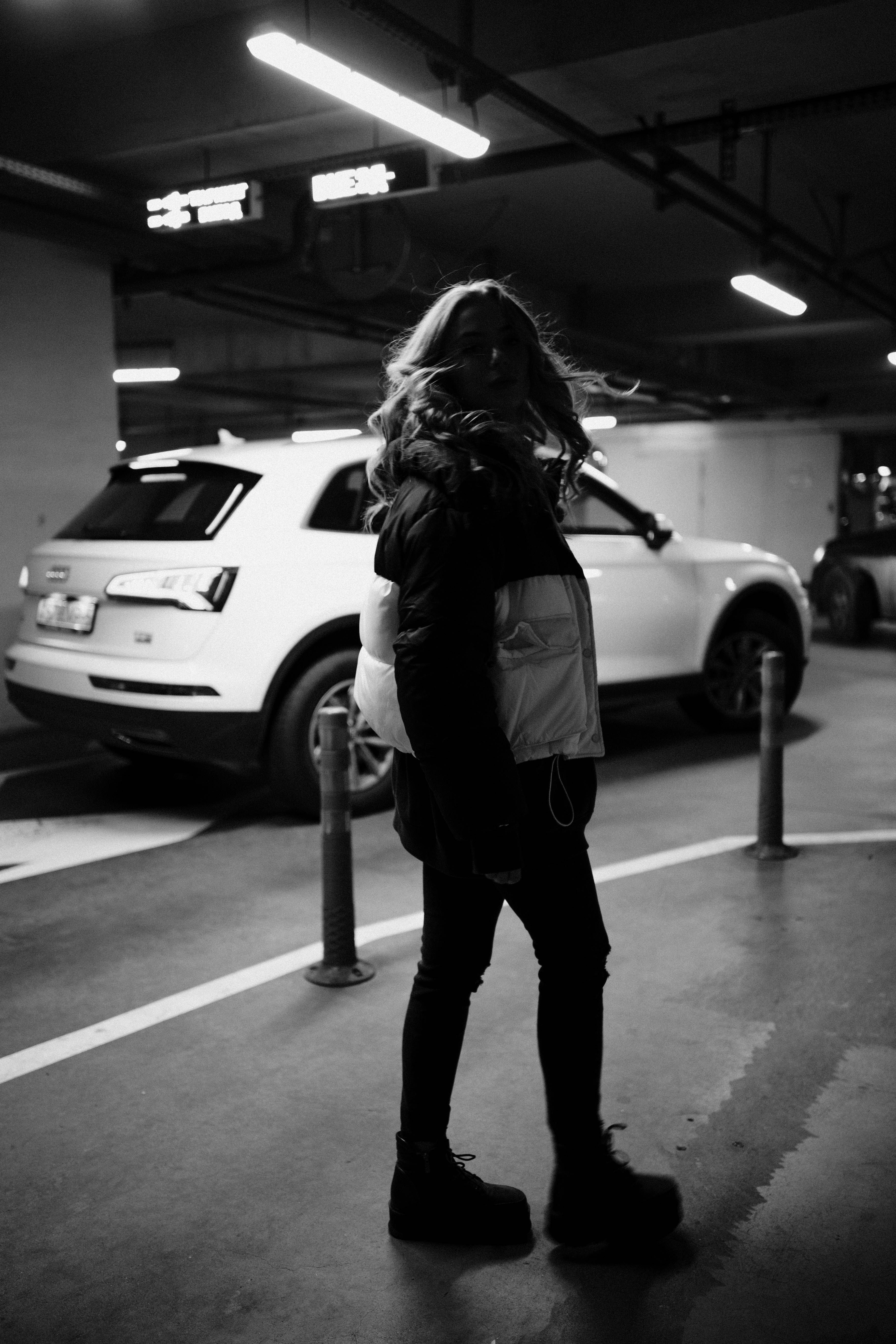 Woman Standing by Car in front of Supermarket · Free Stock Photo