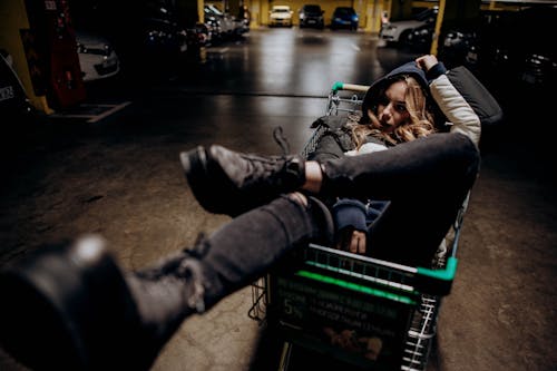 High Angle View of Woman in Shopping Cart