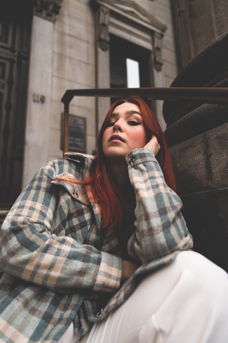 Redhead Woman In Shirt Sitting