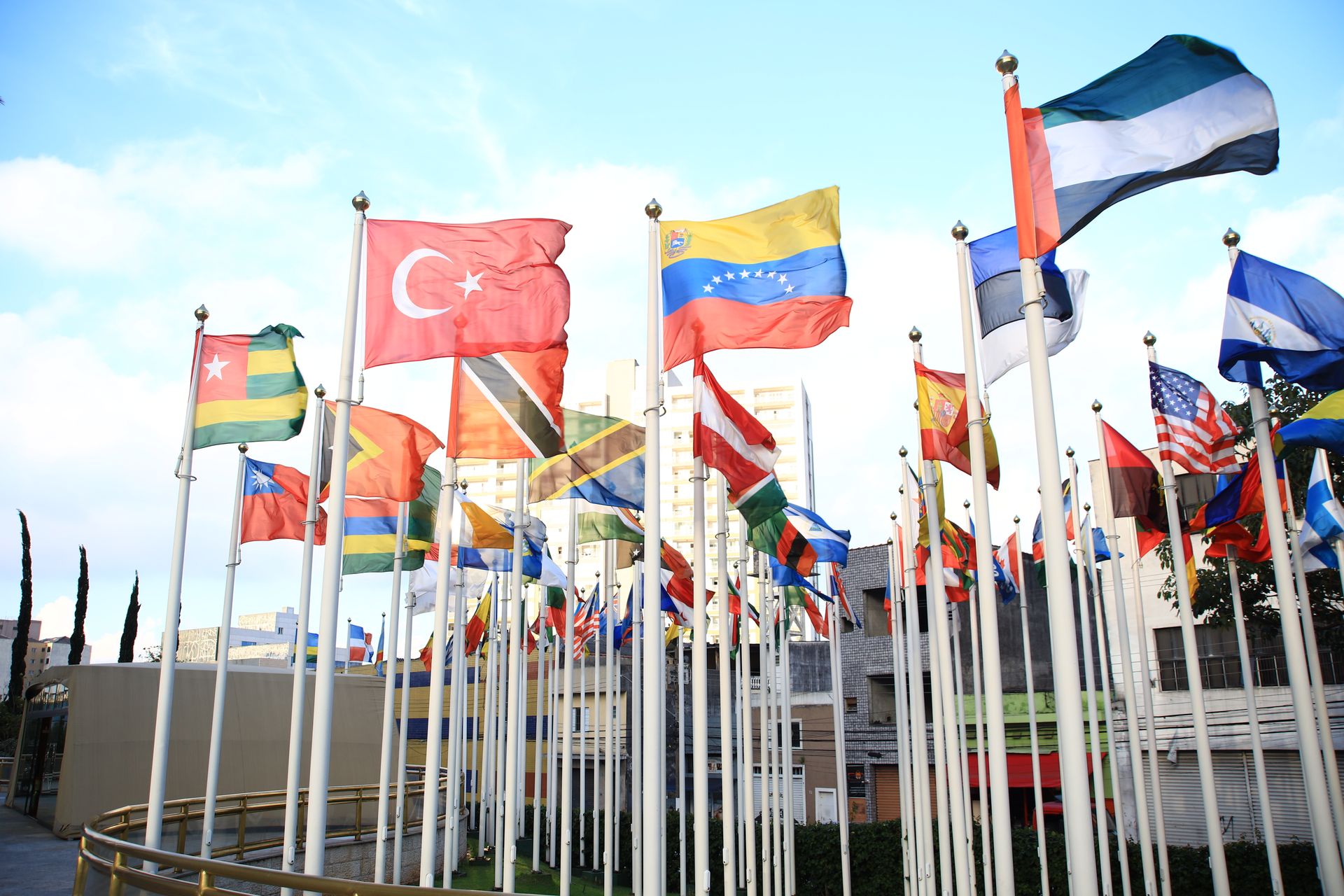 National flags at a diplomatic conference table