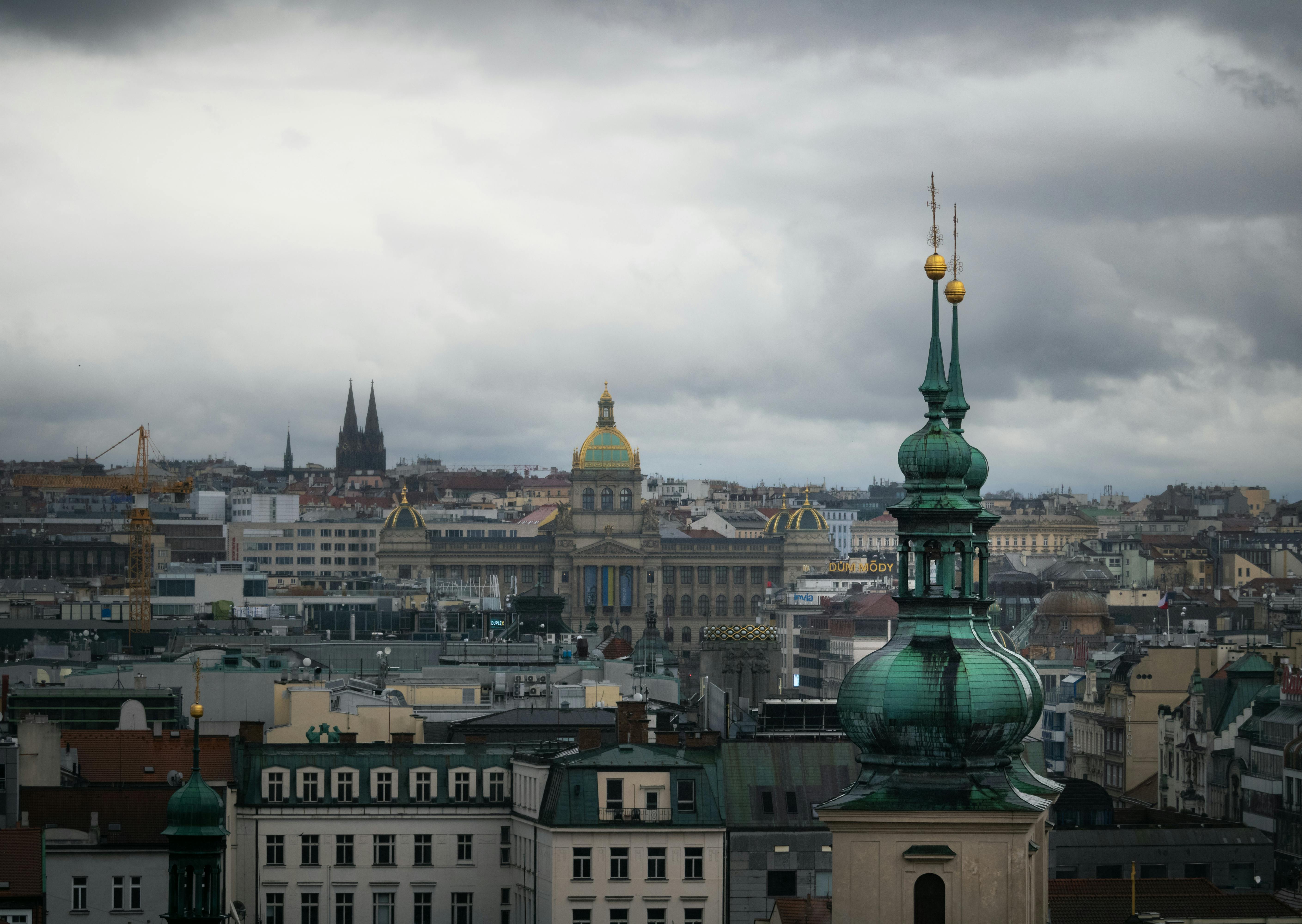 a view of the city of prague from a rooftop