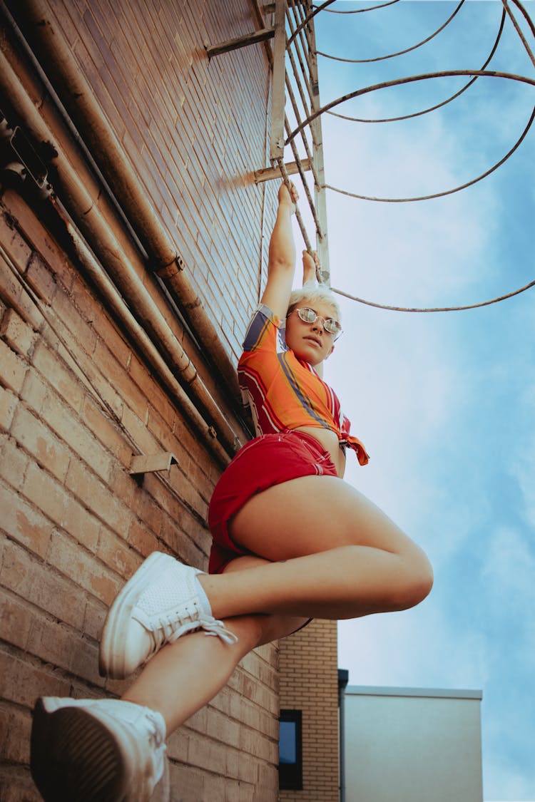 Woman Posing Under Ladder