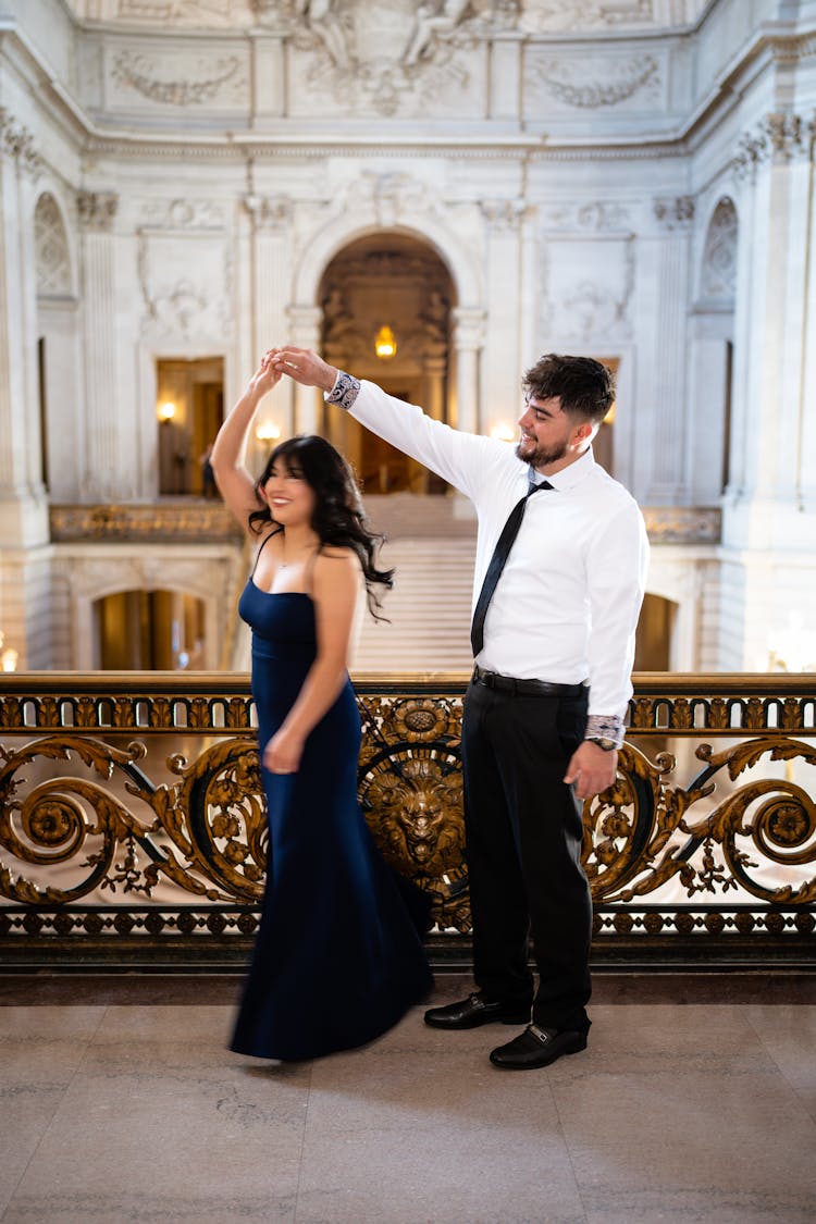 Young Elegant Couple Dancing In A Palace 