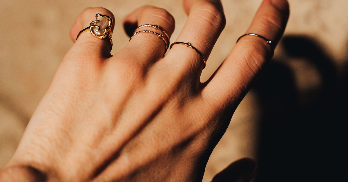 Hand By Hand Rings Hand with Rings · Free Stock Photo