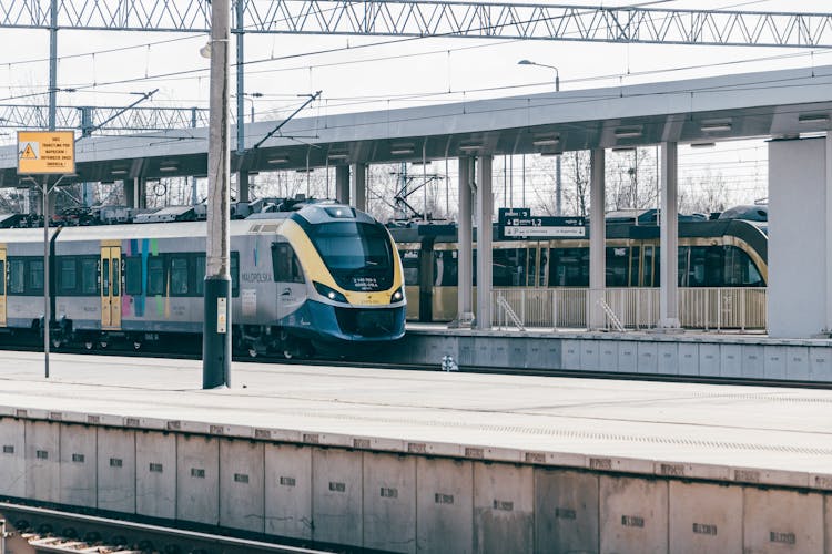 Passenger Train At A Railway Station In Poland 