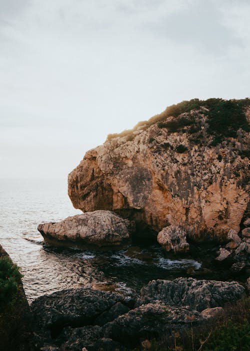 Sea and a Rocky Cliff 