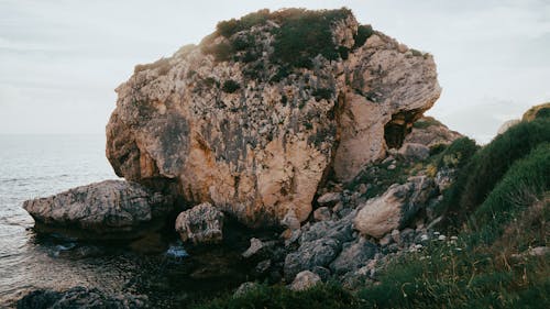 Foto profissional grátis de à beira-mar, beira-mar, corroído