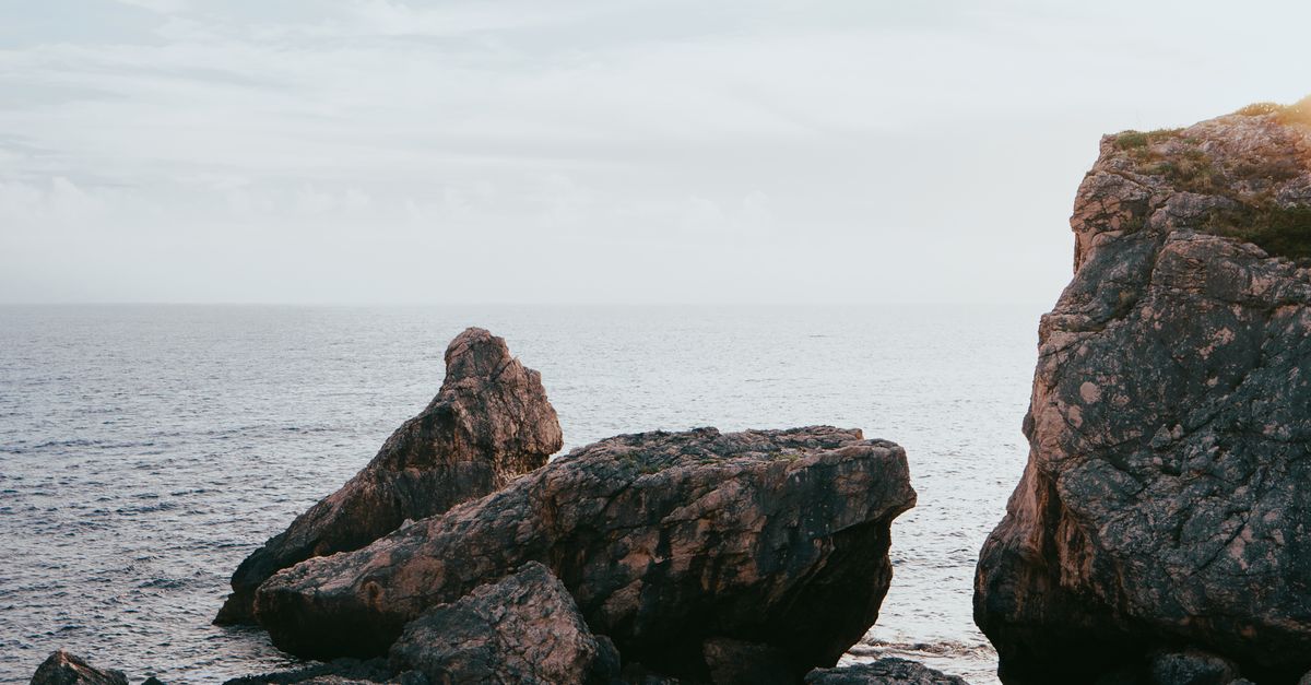 Pointy Rocks At Cliffs Rocks on the Cliff · Free Stock Photo