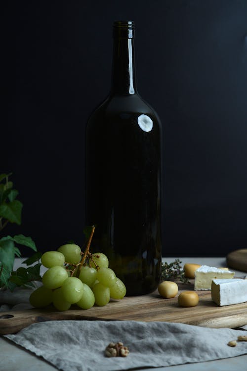 Bottle of Wine and Grapes 