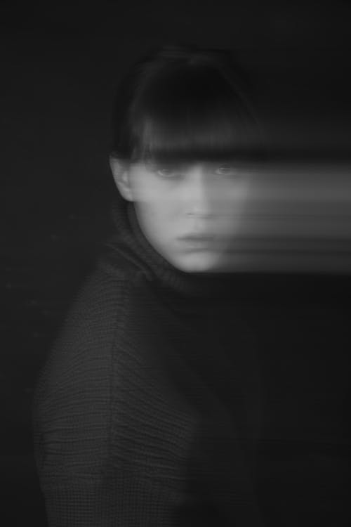 Artisitc, Black and White Studio Shot of a Woman with Bangs 