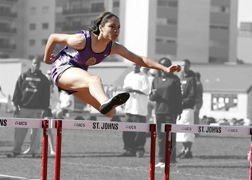 Woman in Purple Tank Top Run Olympics Games