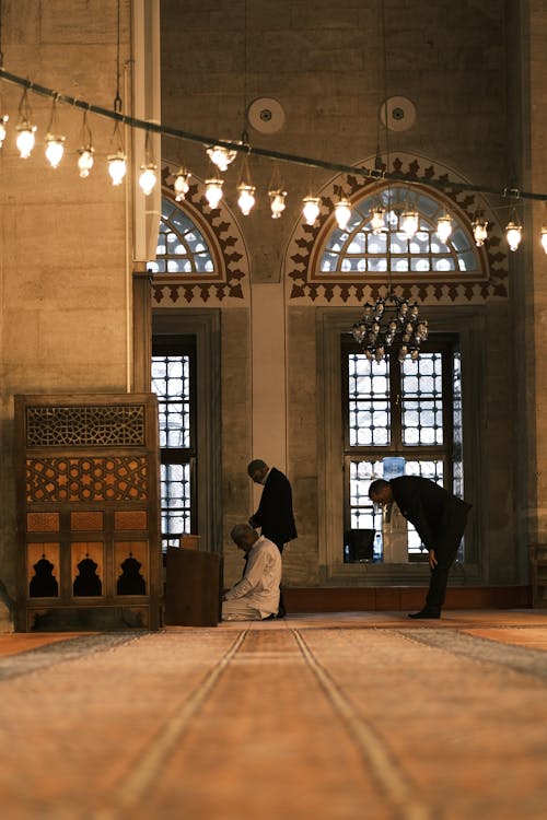 People Praying in a Mosque 