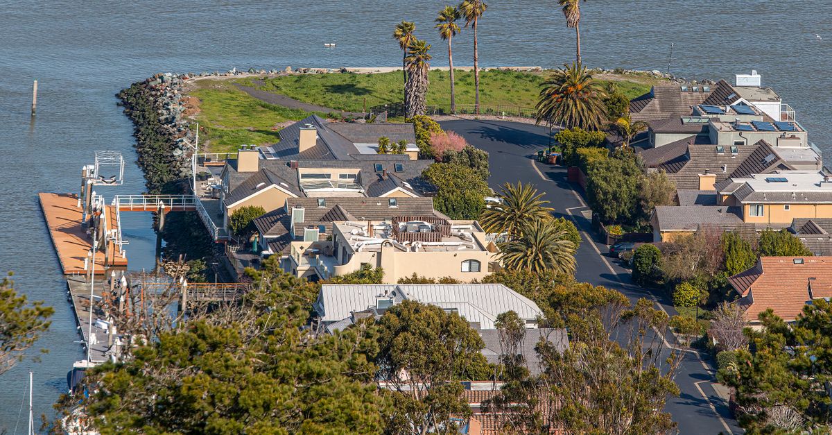 Explore the scenic coastal luxury homes with lush greenery and ocean views.