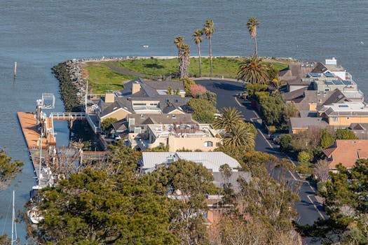 Explore the scenic coastal luxury homes with lush greenery and ocean views.