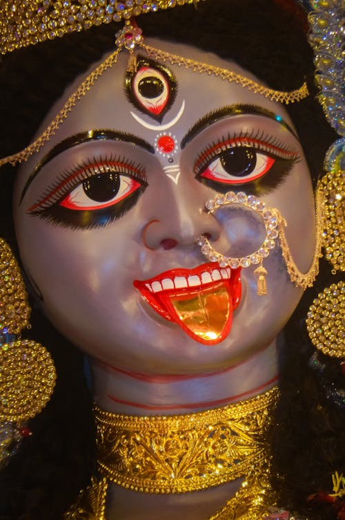 Close-up of a Colorful Goddess Figurine 