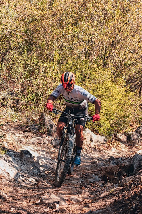 Man Riding on a Mountain Bike on Extreme Terrain 