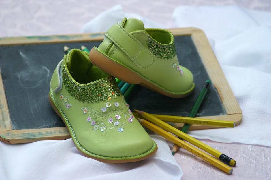 Green Slip on Shoes Near Yellow and Green Pencil