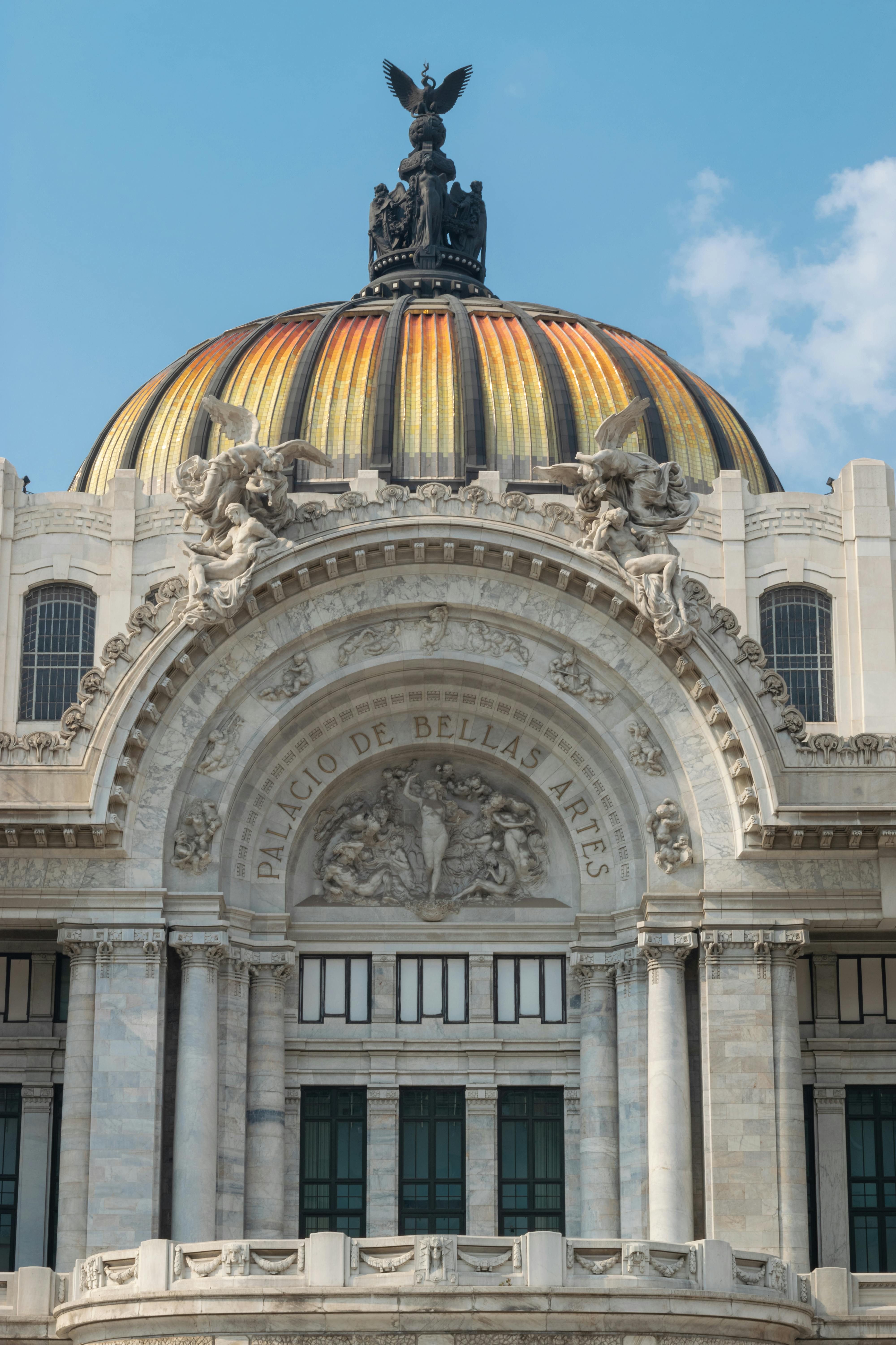 photo of the facade of the palacio de bellas artes in mexico city
