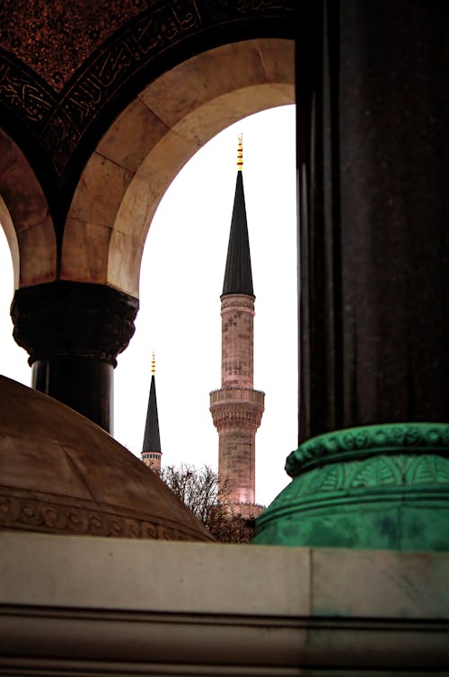 Minaret behind Wall Arches