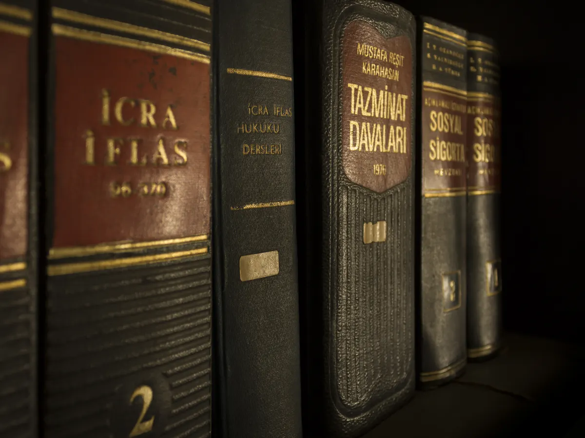 A shelf of legal books, representing the knowledge and resources available to Delhi supreme court lawyers.