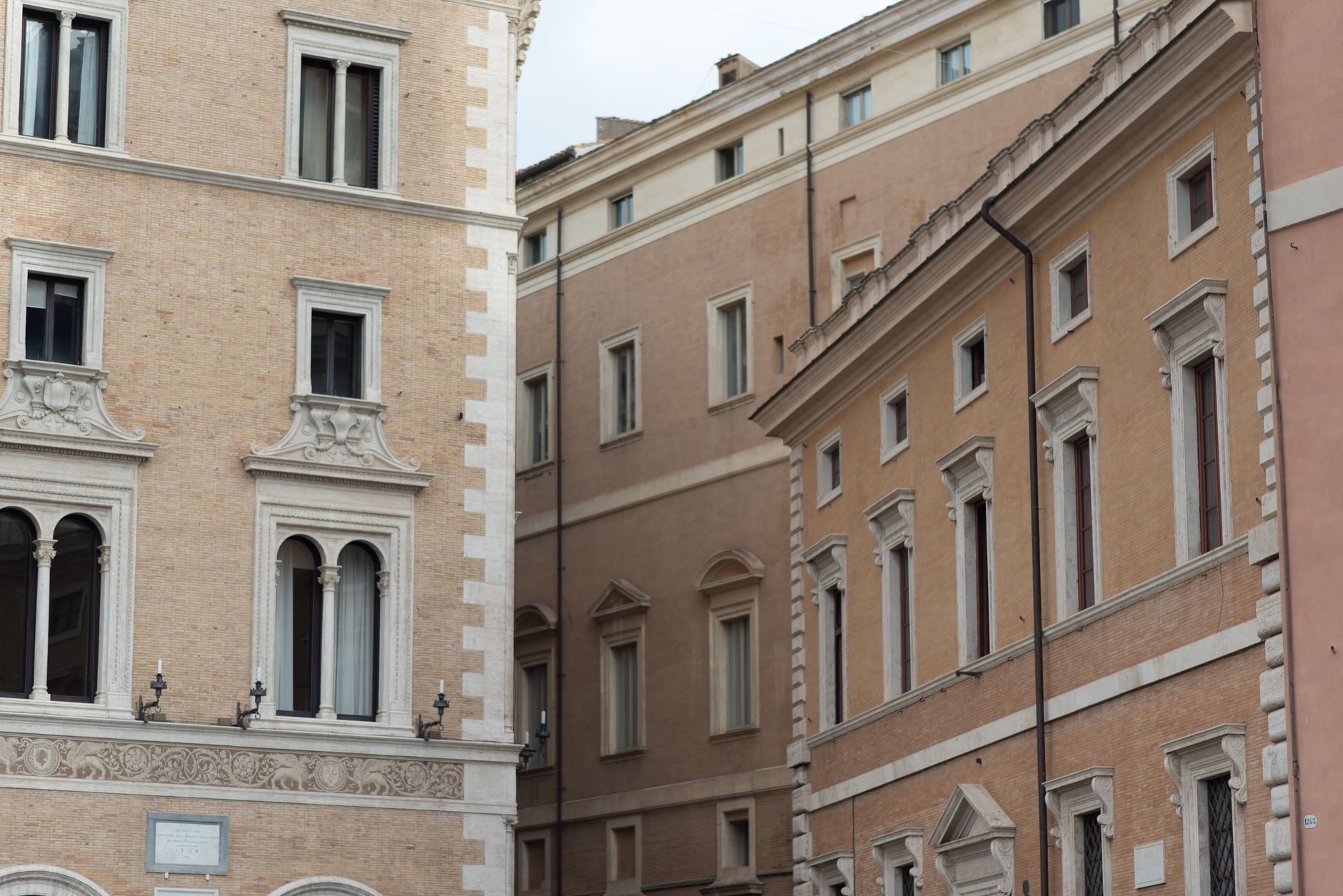 Elegant façades captured in Rome, showcasing Italian architectural styles.