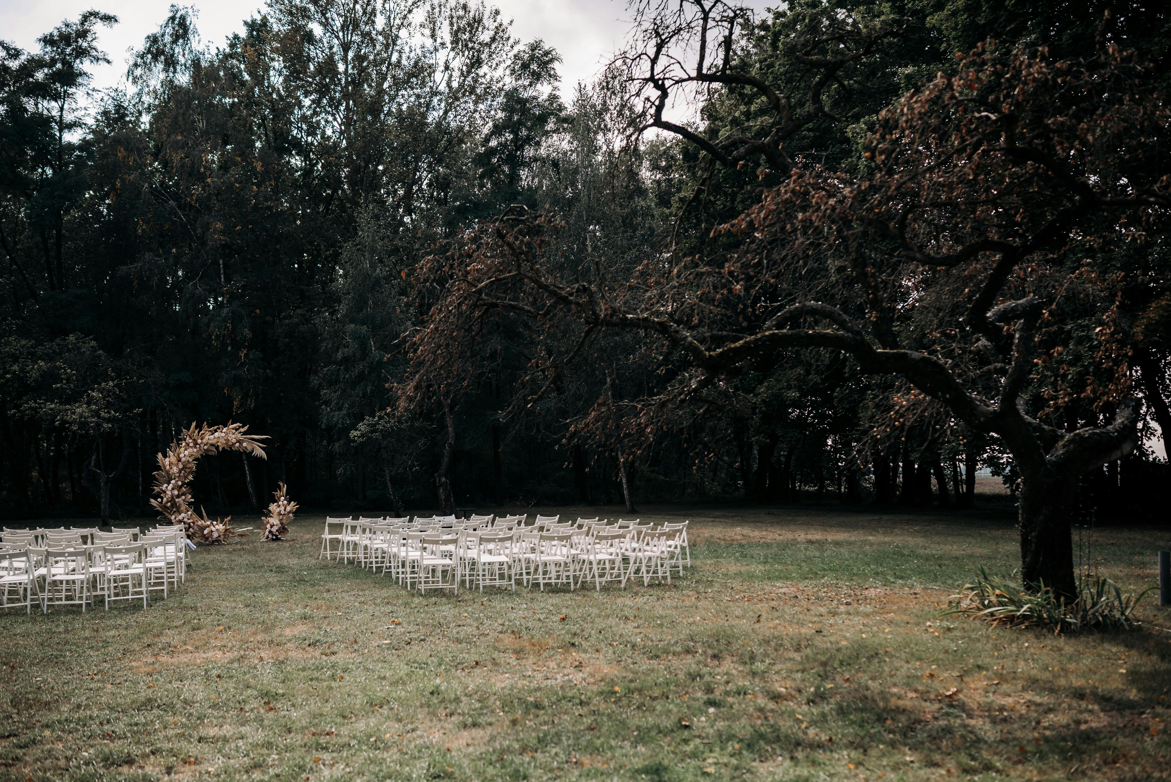 Kylan Barn woodlands ceremony site with natural archway - Barn wedding venues Maryland