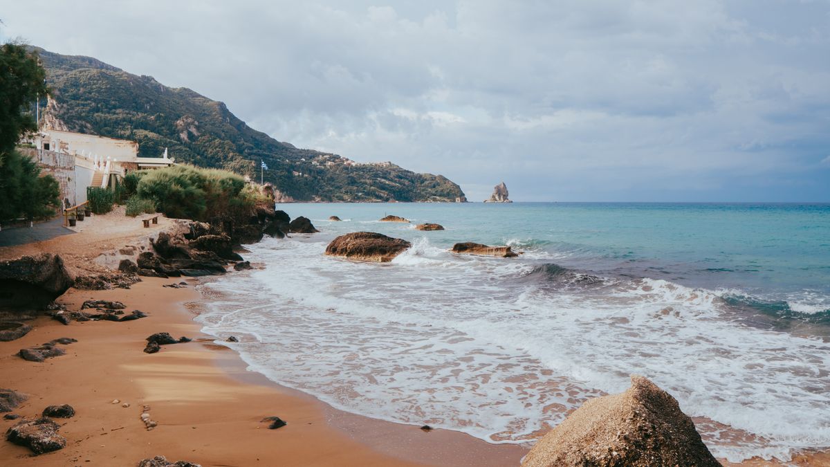 Beach and turquoise sea in Corfu Greece