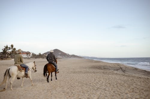 Men on Horses on Beach