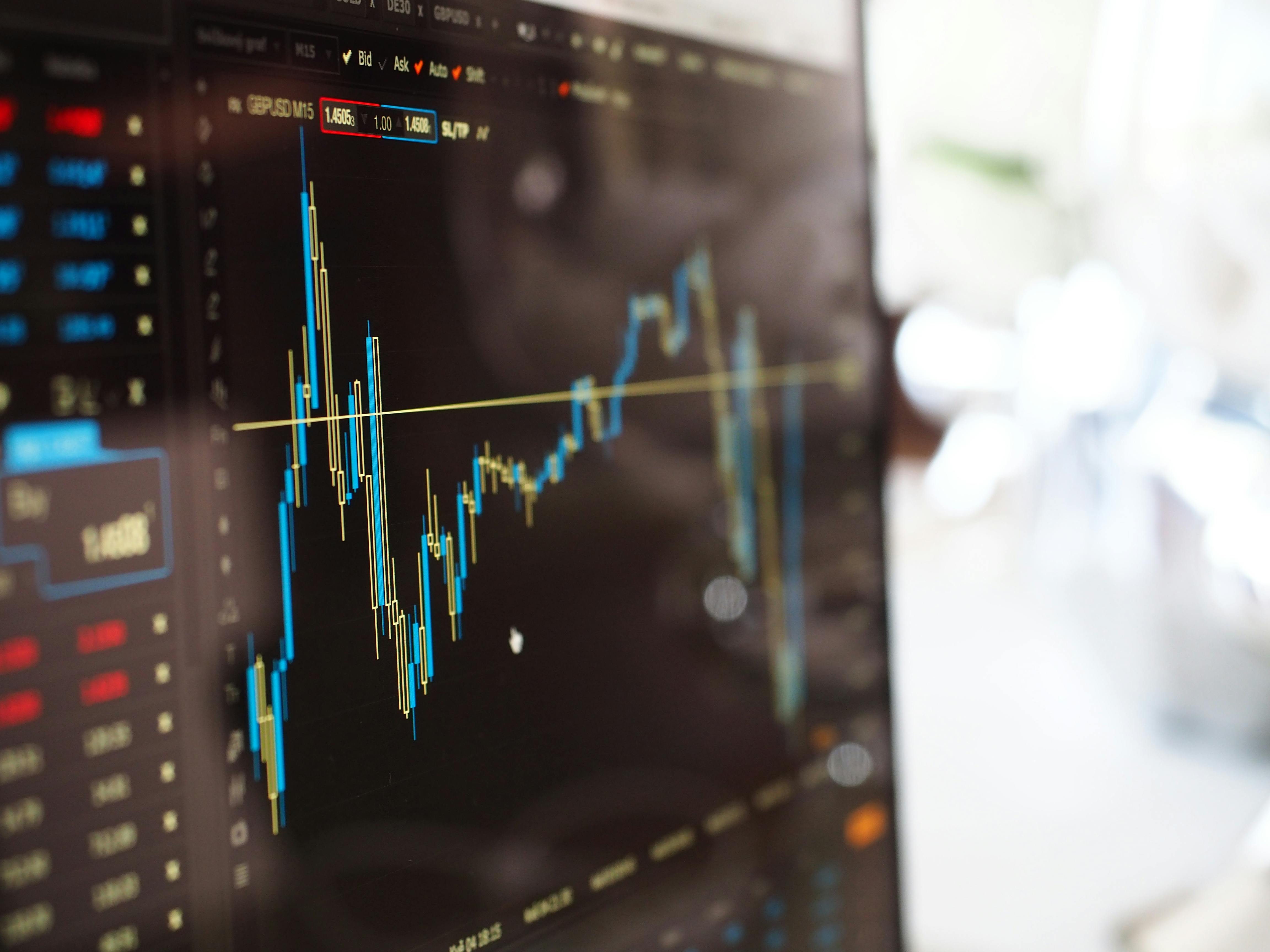 Stock market data on a computer screen illustrating rapidly changing economy and the growing demand for digital and analytical skills.