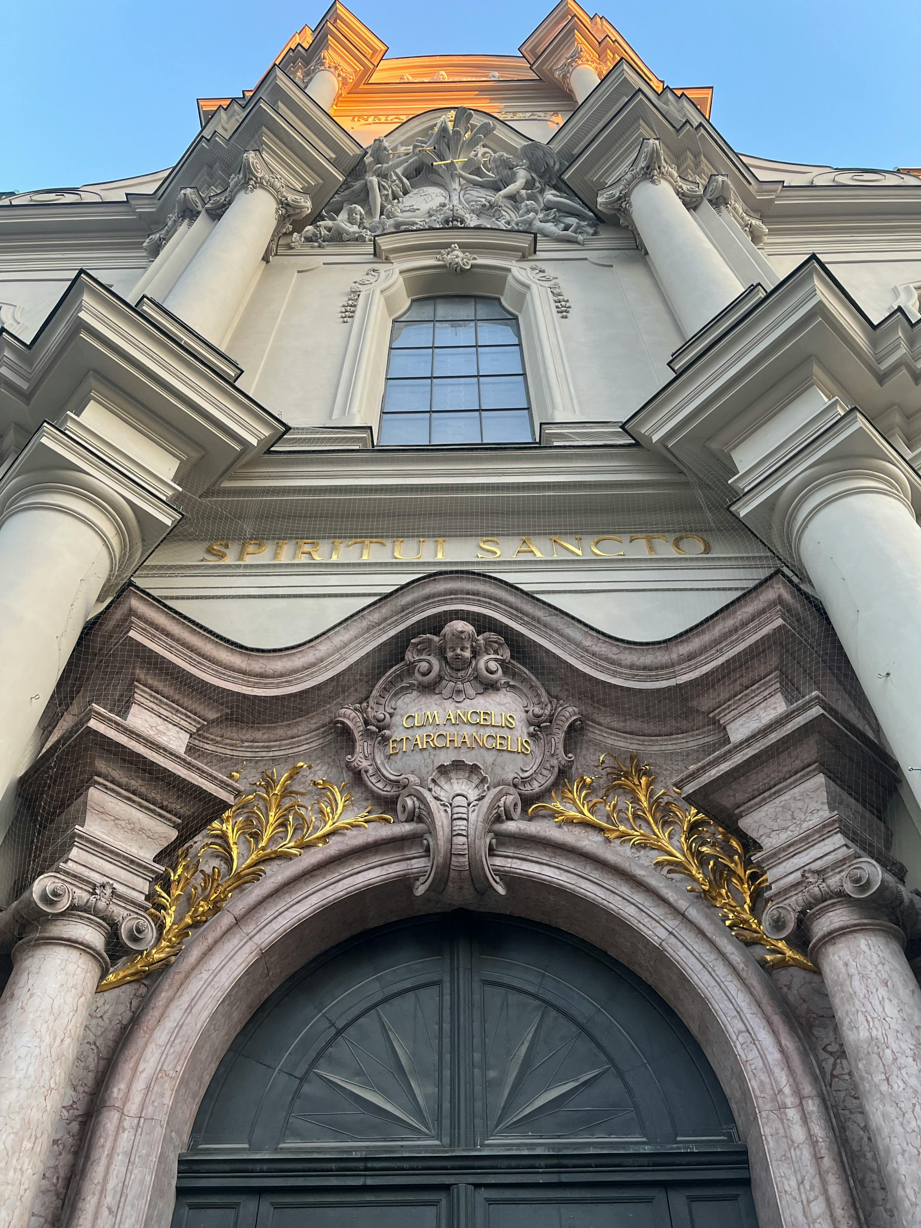 low angle shot of the facade of the church of the holy ghost in munich germany