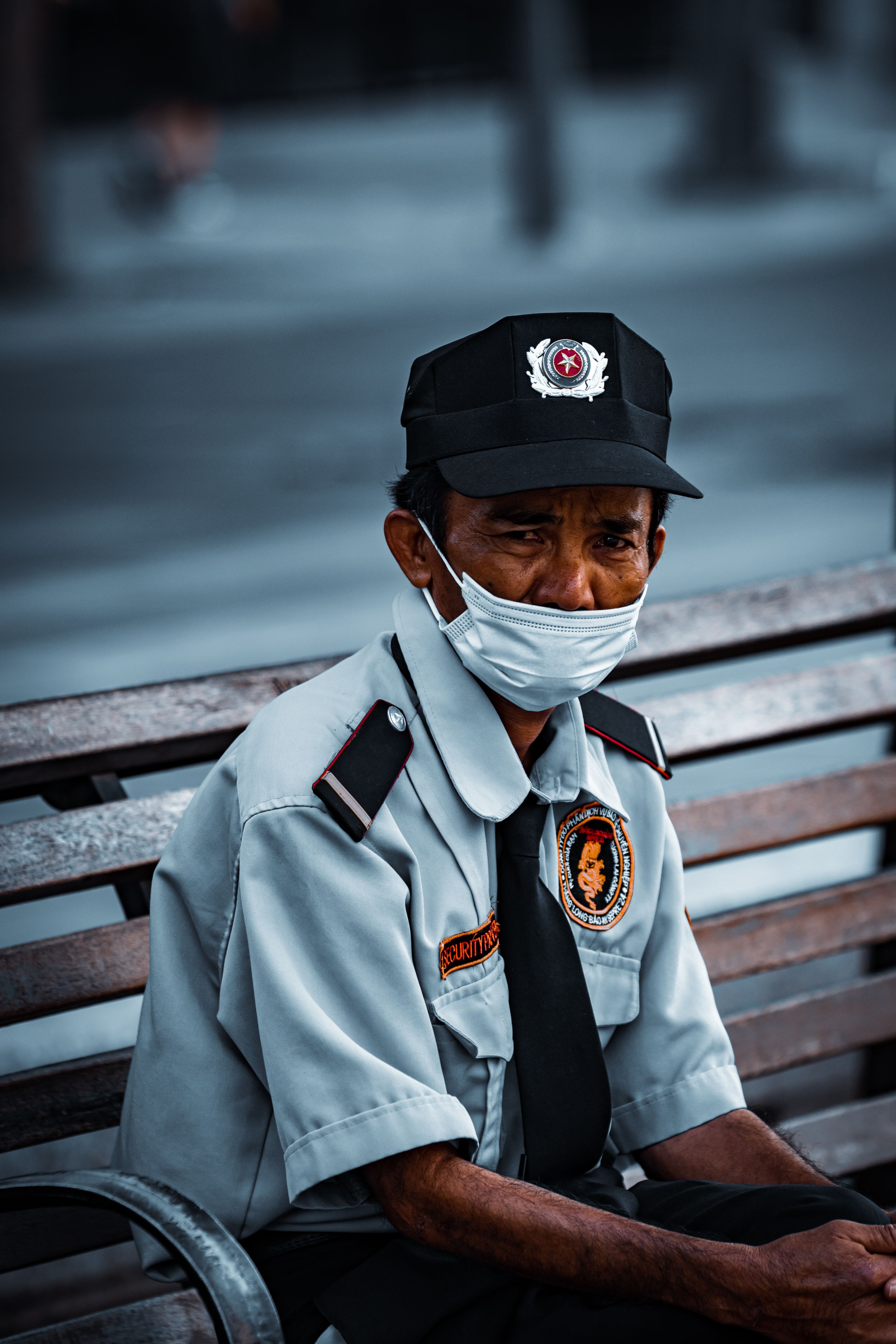 Man in a Uniform Wearing a Face Mask · Free Stock Photo