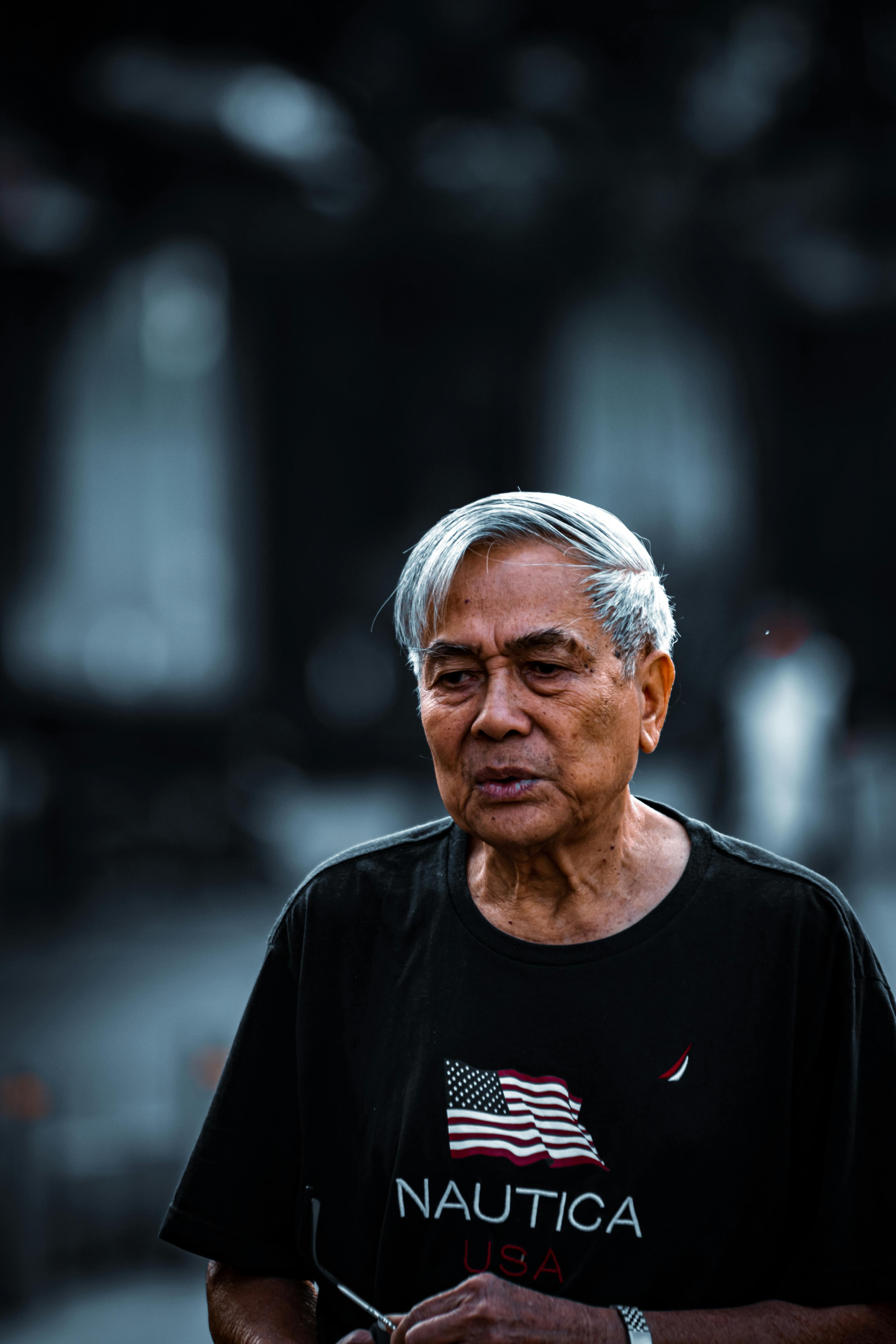 elderly man wearing a t shirt