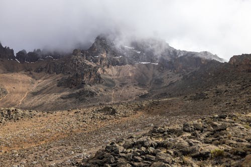 Photo of a Mountain Range amid Fog 