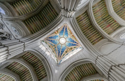 Low Angle Photography of Stained Glass Ceiling