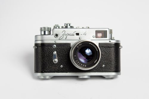 Free Classic Zorki 4 rangefinder camera with Cyrillic branding from Soviet era. Stock Photo